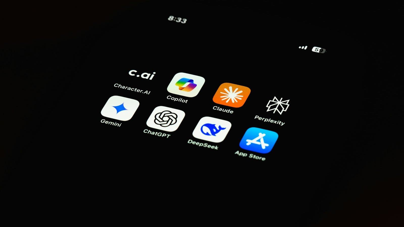 A phone screen with the Copilot, Claude, Gemini, ChatGPT and Perplexity apps